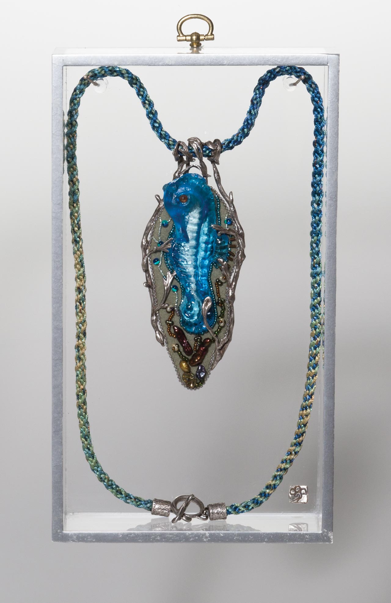 seahorse talisman in box